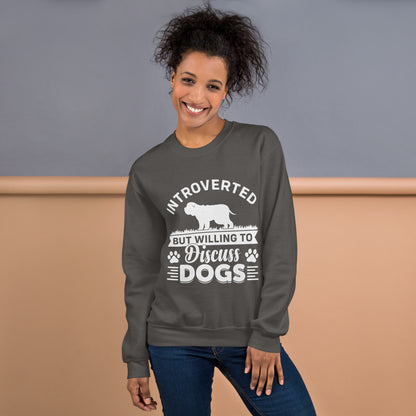 Model wearing a sweatshirt in Charcoal with a white dog silhouette and Introverted But Willing to Discuss Dogs lettering