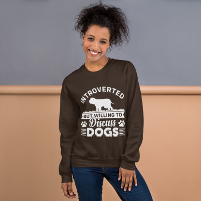 Model wearing a sweatshirt in Dark Chocolate with a white dog silhouette and Introverted But Willing to Discuss Dogs lettering