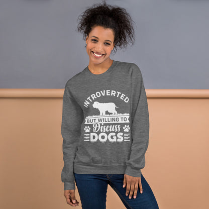 Model wearing a sweatshirt in Graphite Heather with a white dog silhouette and Introverted But Willing to Discuss Dogs lettering
