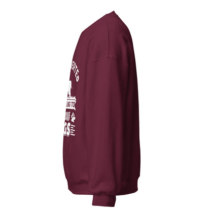 Side view of a sweatshirt in Maroon with part of the white dog-themed chest print visible