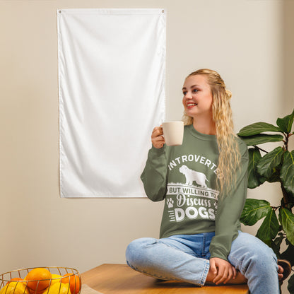 Model wearing a sweatshirt in Military Green with a white dog silhouette and Introverted But Willing to Discuss Dogs lettering